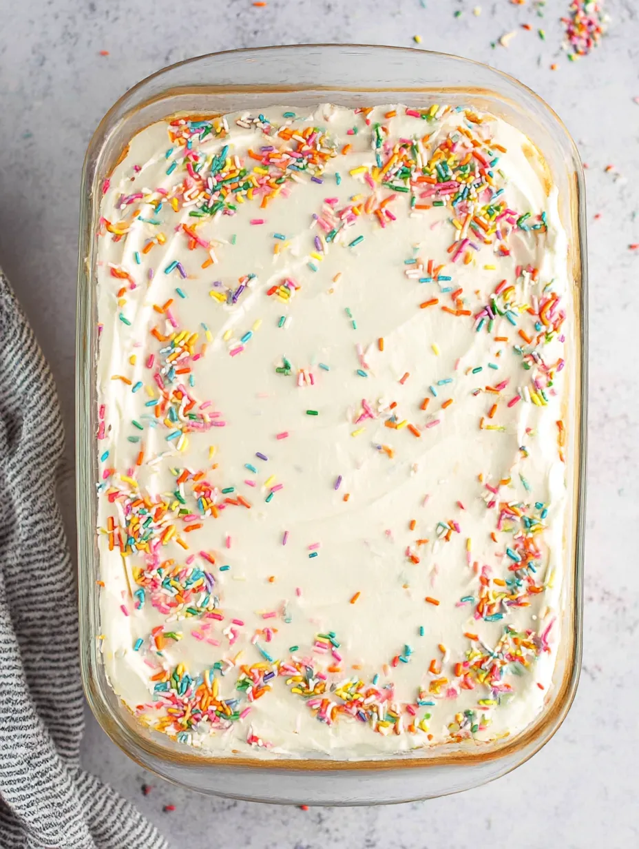A cake with sprinkles on top.